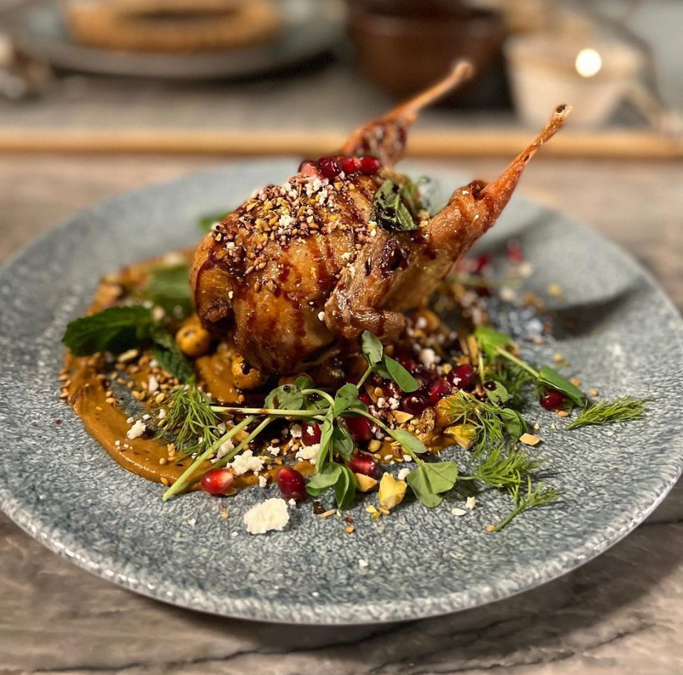 roasted quail with feta, pomegranate, and pistachio muhammara @statebirdprovisions