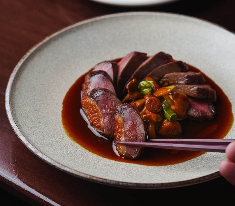 Magret Duck Breast BC Chanterelle mushrooms, yuzu kosho jus at @kissatanto (Vancouver)