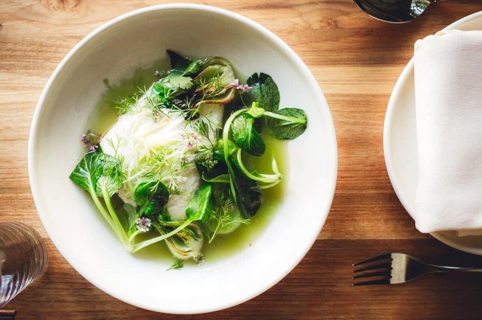 Alaskan halibut, young ginger, scallion and tat soi in a summer squash broth  at @misterjius