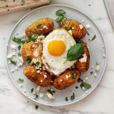 Hasselback potatoes with cheese and egg