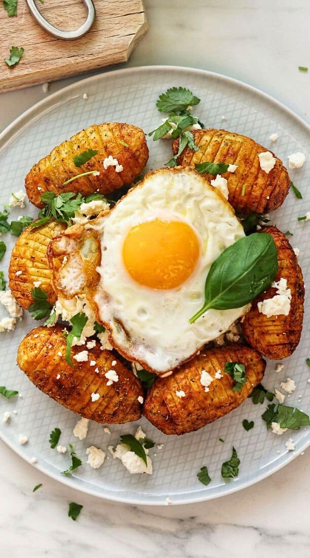 Hasselback potatoes with cheese and egg