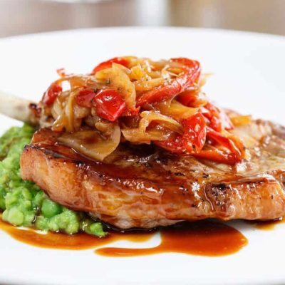 PORK CUTLET, CRUSHED GARDEN PEAS WITH RED PEPPER RELISH