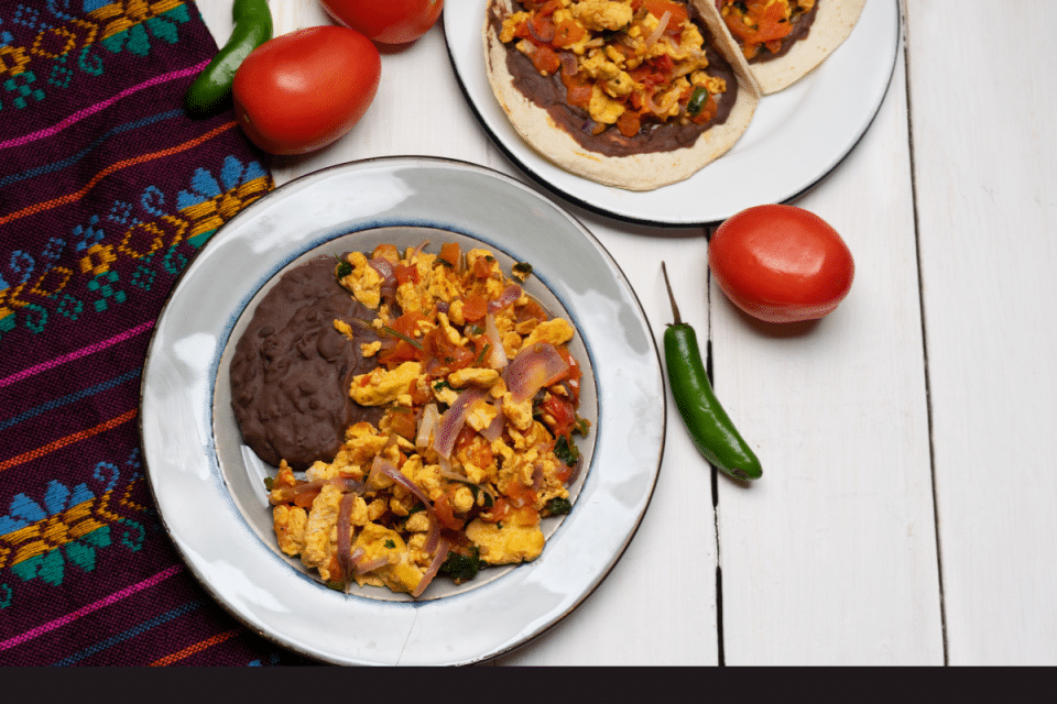 Scrambled eggs with chorizo and refried beans