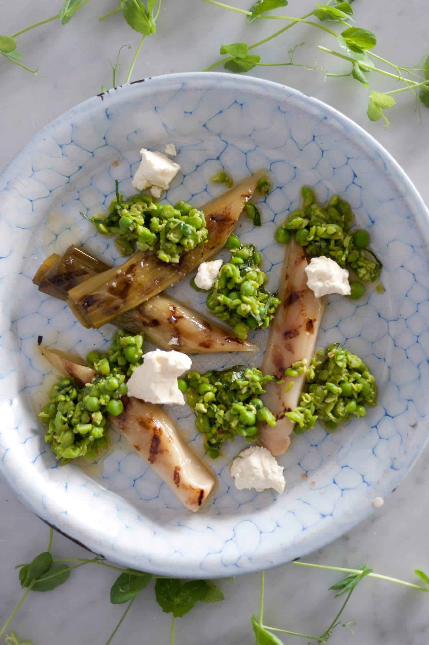 Salad of Slow-cooked Leeks with crushed peas feta and mint